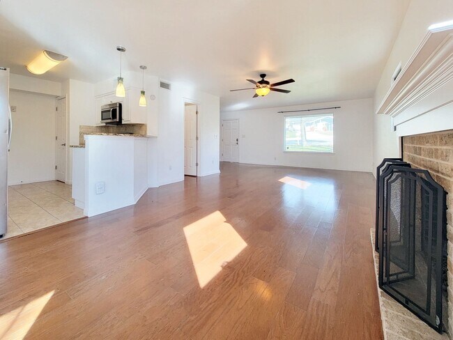 Building Photo - Spacious 4/BR 2.5/BA Two-Story Home with Fireplace & Huge Fenced Yard