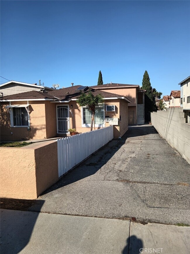 Unit is upstairs in back - 2619 Rockefeller Ln