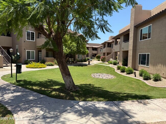 Building Photo - 9451 E Becker Ln