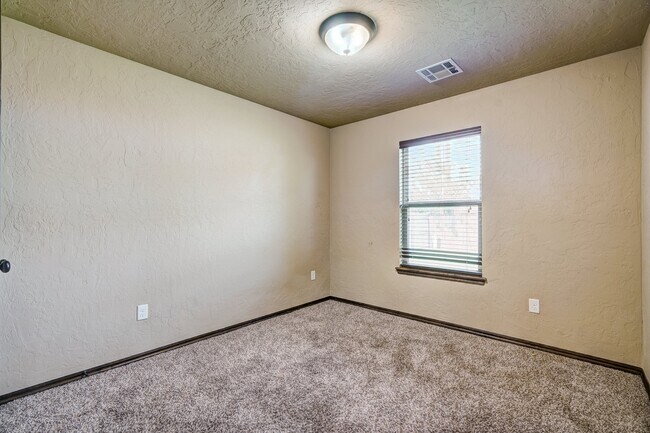 Building Photo - AVAILABLE THE END OF APRIL! 3 OR 4 BDRM, 2 BATHRM, 2 CAR & STORM SHELTER