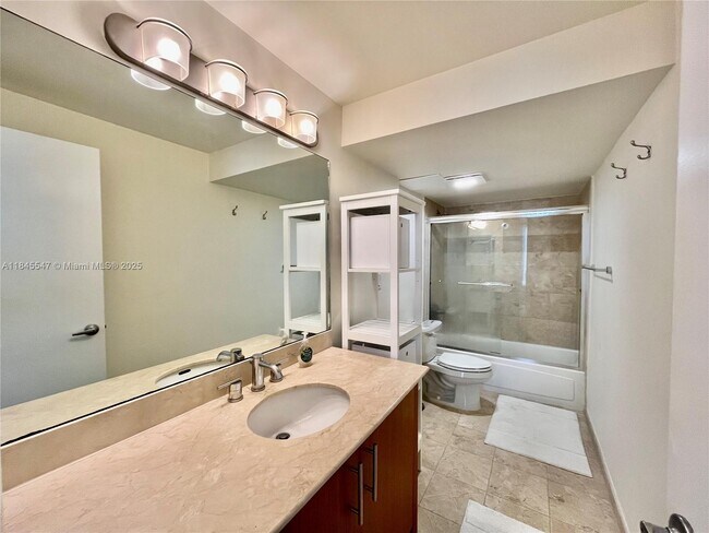 Building Photo - 10275 Collins Ave