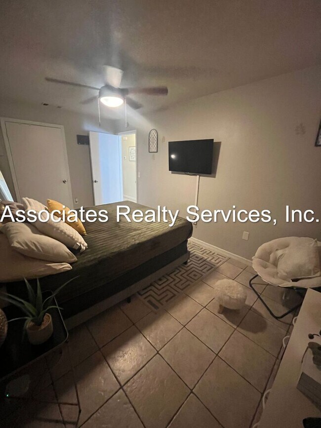Building Photo - Beautifully furnished  2-Bedroom Duplex – ...