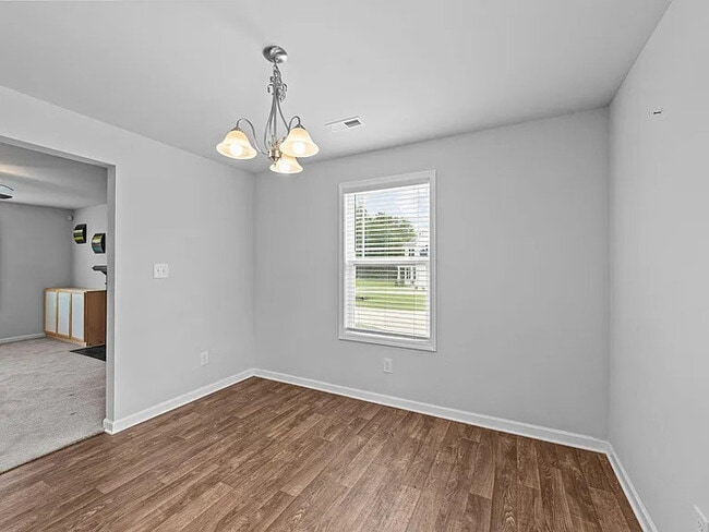 Building Photo - Earn Wealth While Leasing - Like a Homeown...