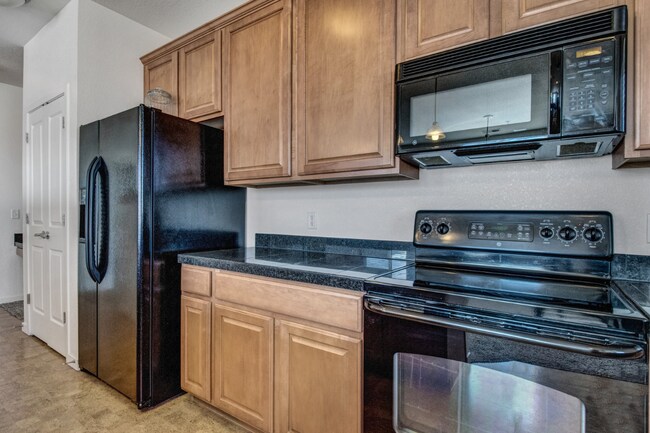 Building Photo - 2BD/2.5BA Condo with Parking Spot and Garage at Parkhill  AVAIL NOW!