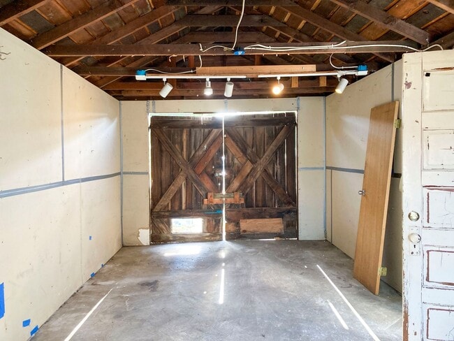 Building Photo - Pet-friendly home with a detached garage!