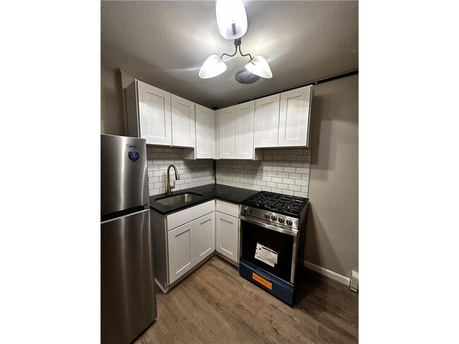 Building Photo - 453 13th Ave NW