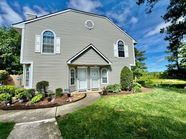 Building Photo - Available 06-15-25! End-Unit Condo w/2 Pri...