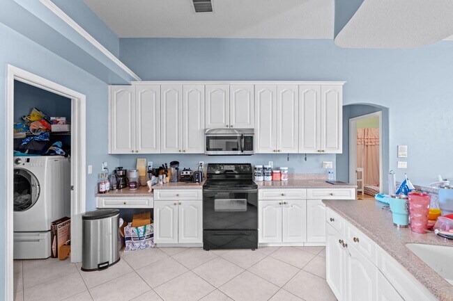 Building Photo - 103 Black Olive Crescent
