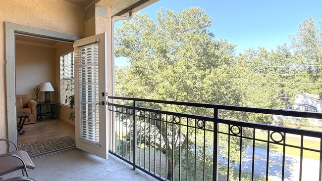 Building Photo - Move-in ready and Fully Furnished! This beautifully maintained 3-bedroom, 3-bath Condo offers a R...