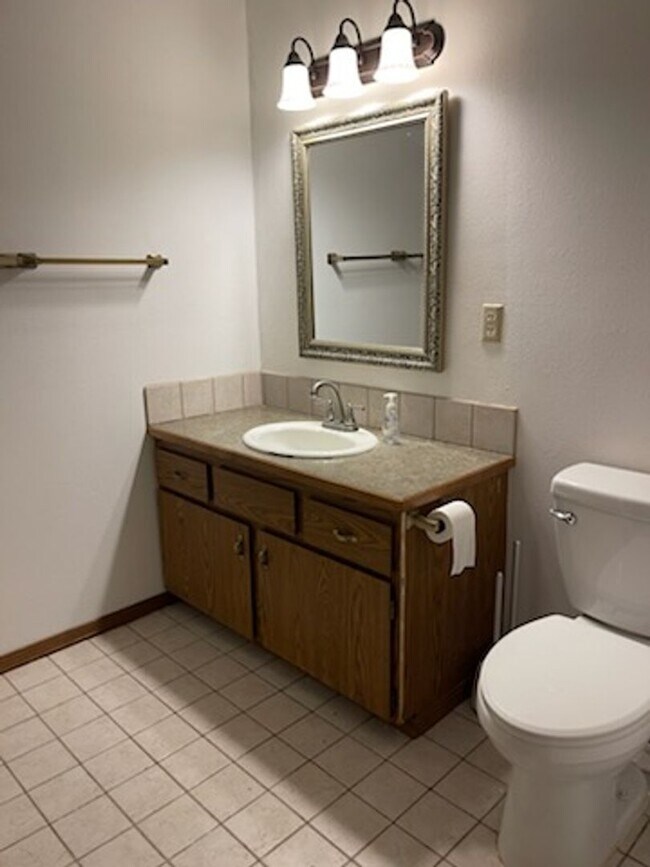 Building Photo - Waterfront! Sunset views! 3 bdrms! Attached garage! Private driveway!