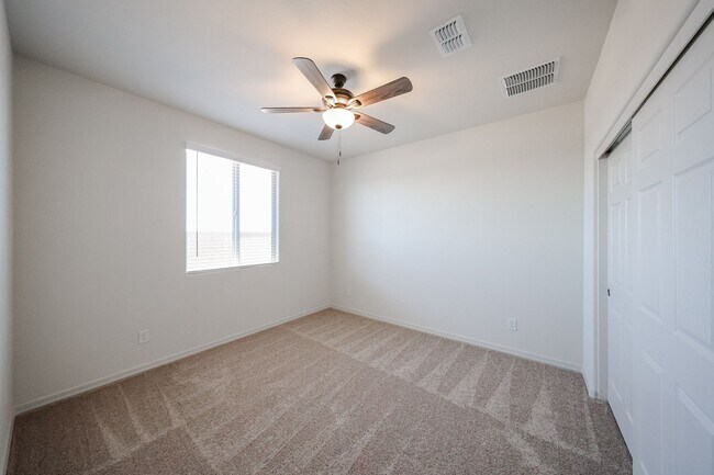 Building Photo - New 4 Bedroom + Den Home in Asante Community