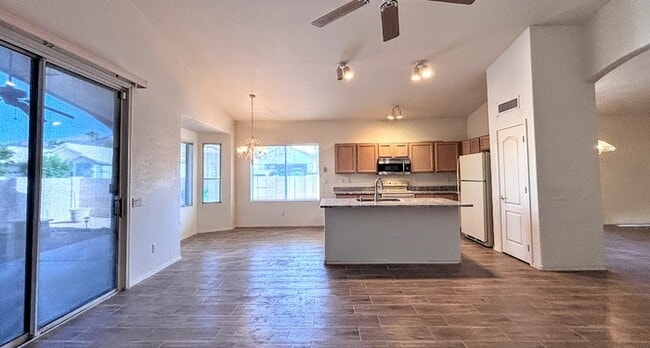 Building Photo - Spacious 4BR 2BA Home w/ Mountain-View Patio • Granite Counters • 2-Car Garage in Tucson