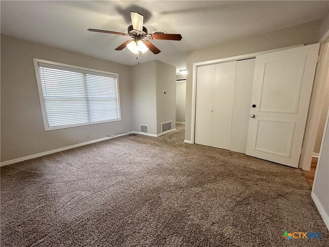 Building Photo - 4902 Dahlia Ln