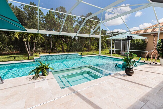 Building Photo - Lakeside Luxury Home With Pool in Reflecti...