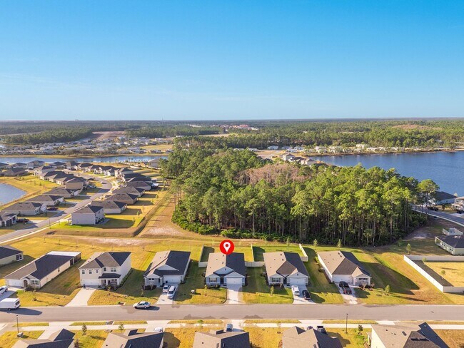 Building Photo - Never Lived in 4 Bed, 2 Bath Ormond Home with Upgrades and a Fenced Yard