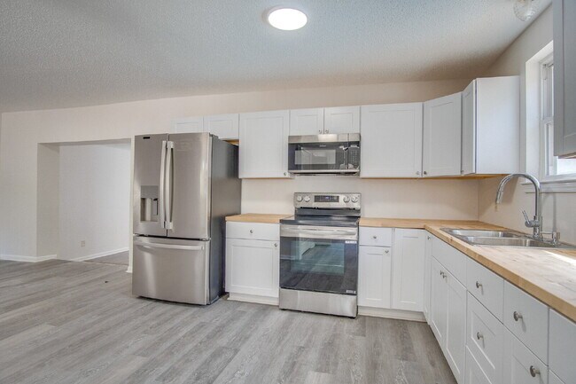 Building Photo - Stunning 4BR/2BA Pensacola Home with Private Pool, Modern Kitchen, Luxury Vinyl Flooring, Fully F...