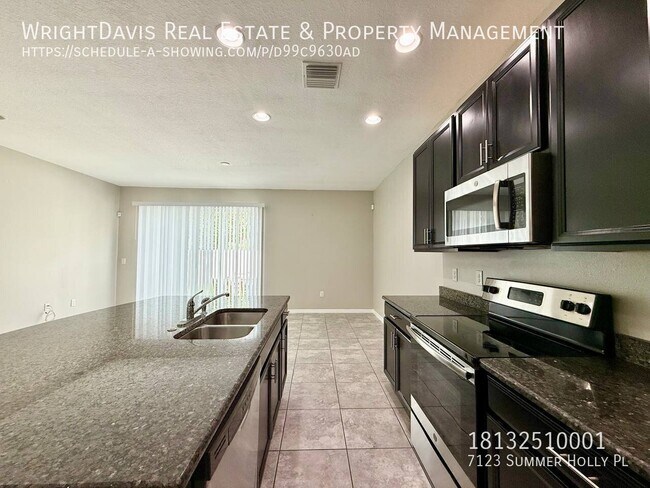 Building Photo - 7123 Summer Holly Pl