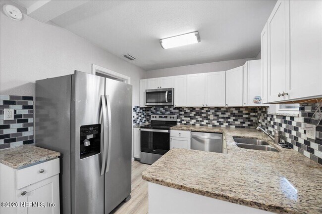 Building Photo - 5395 Poppy Dr