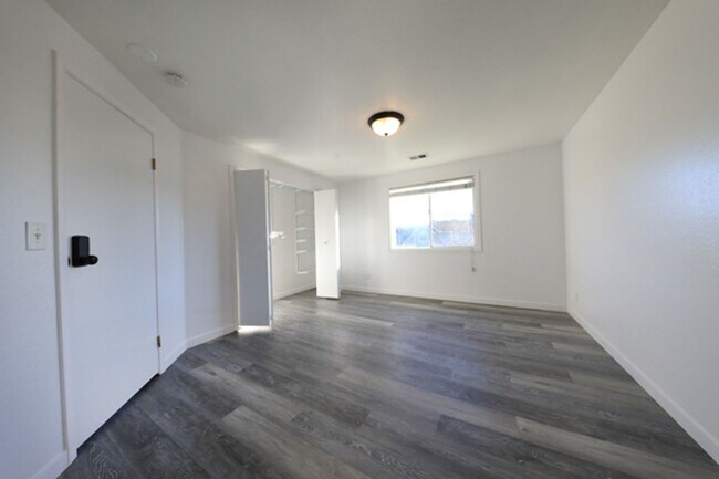 Building Photo - Spacious 3/2 with large yard