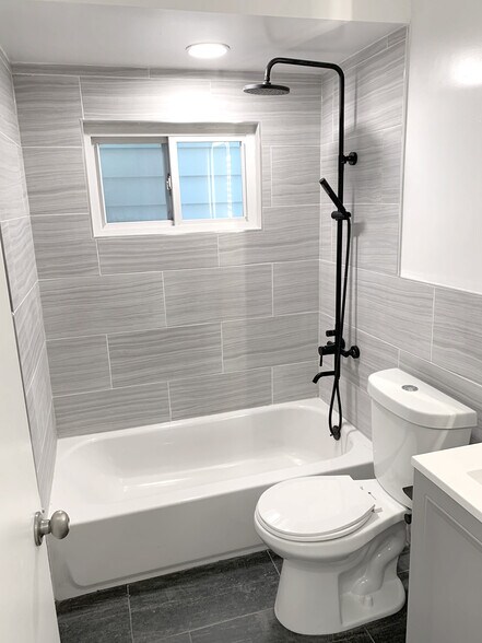 Modern sleek bathroom - 124 73rd St