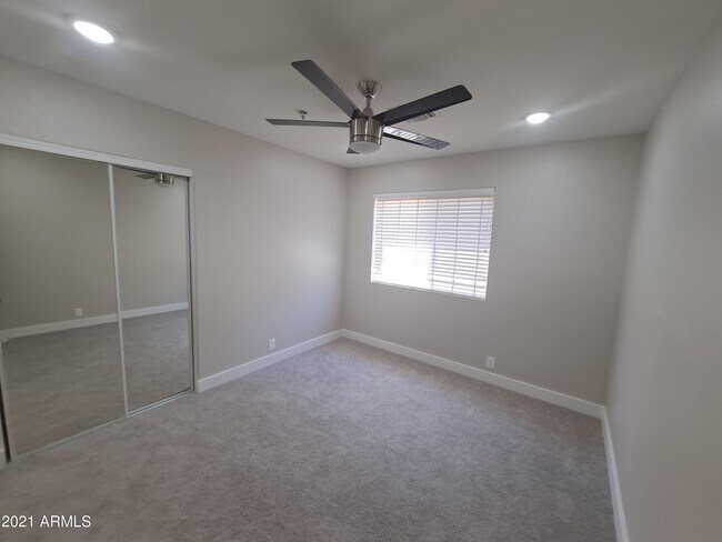 Building Photo - 9074 E Caribbean Ln