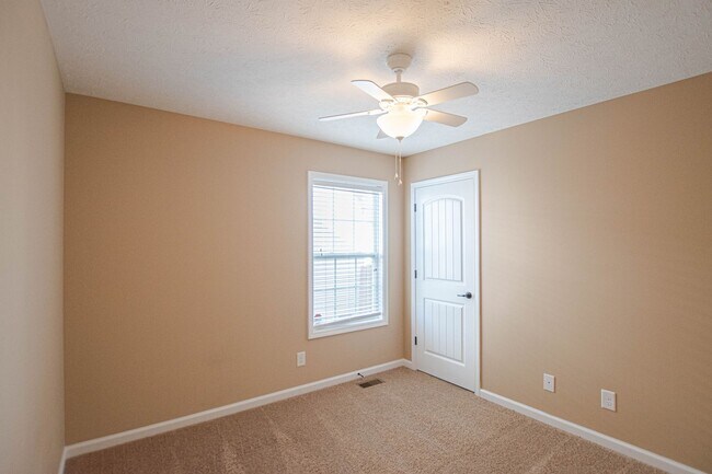 Building Photo - Pet Friendly Three Bedroom with Bonus!