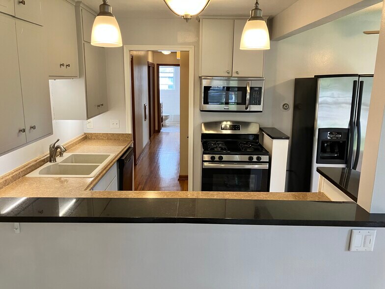 Kitchen View from Breakf ast/ Dining Bar with Sparkly Black Granite - 2824 Texas Ave S