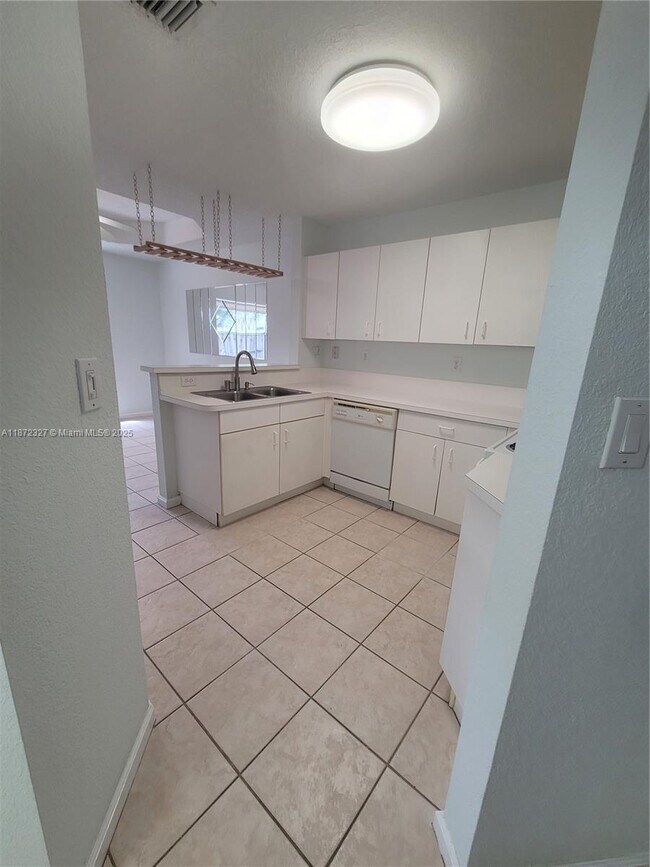 Building Photo - 14385 SW 120th Ct