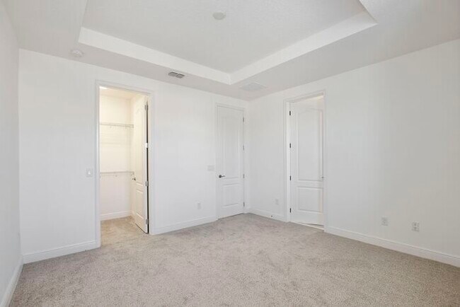 Building Photo - Elegant 2/2.5 Townhome in Guard-Gated Eagl...