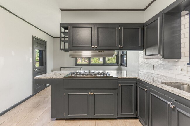 Building Photo - Newly renovated home with a large yard per...