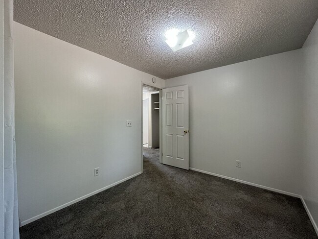 Building Photo - Charming Ranch Home with Sunroom or 4th Bedroom, Two-Car Garage and Fenced Backyard