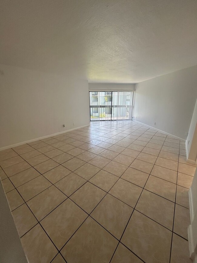 Building Photo - Now Leasing - Two bedroom condo with a pri...