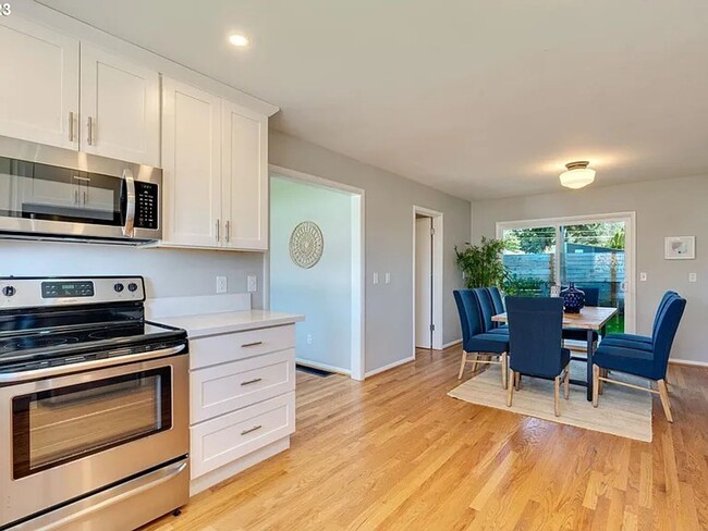 Building Photo - Stylishly Updated Mid-Century Gem on a Qui...