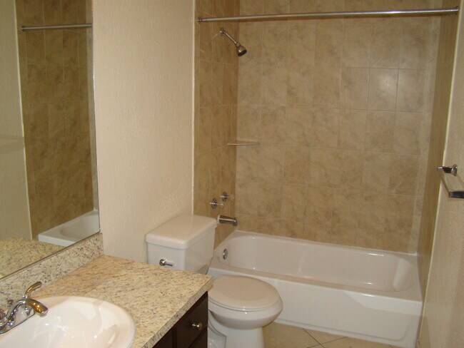 Building Photo - BEAUTIFUL 2/2 IN THE HEART OF CORAL SPRINGS