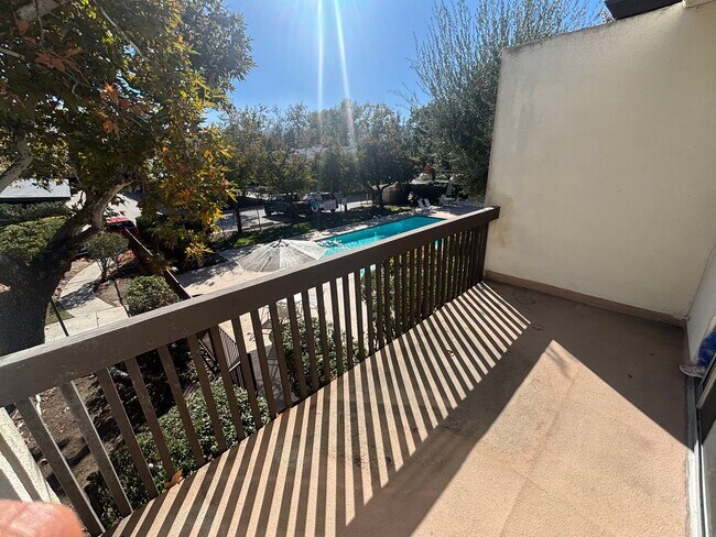 Building Photo - Charming 2-Bedroom Condo with Community Po...