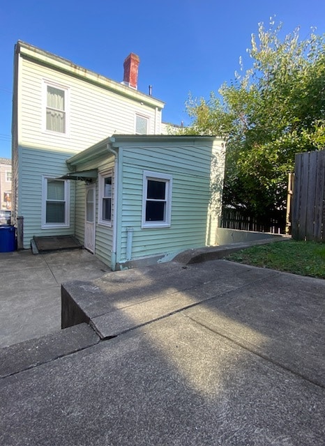 Private patio and back yard with direct access to the kitchen. Great for entertaining! - 5234 Holmes St