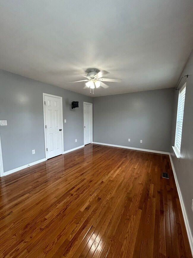 Building Photo - Space, Style - Move-In Ready 4-Bedroom End Unit with Finished Basement & Garage