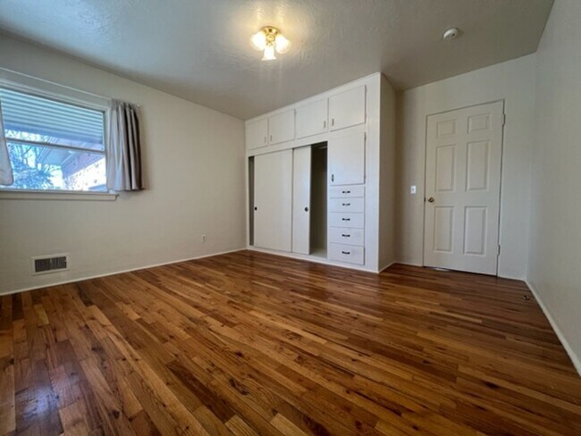 Building Photo - Bi-Level House w/ Massive Backyard, Storage, & Character!