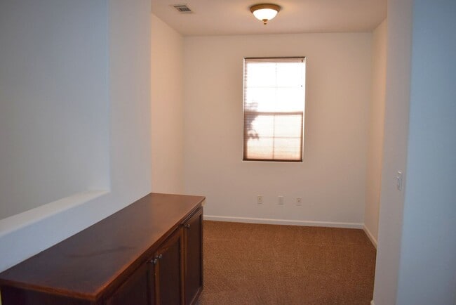 Building Photo - Great home with solar, centrally located n...
