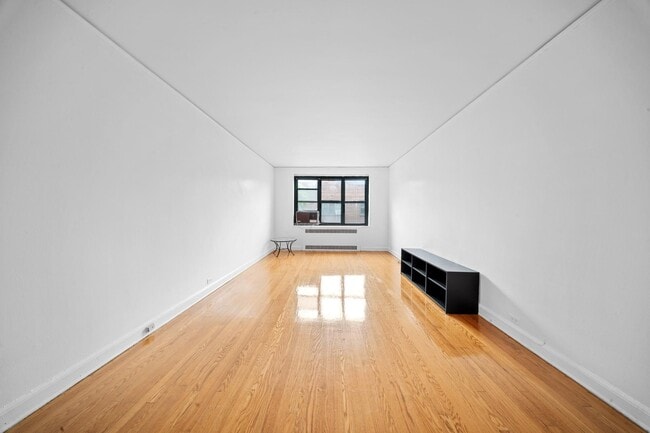 Building Photo - 34-40-40 79th St