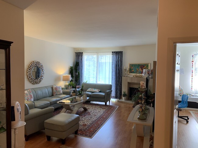Living Room/Fireplace - 10475 Eastborne Ave