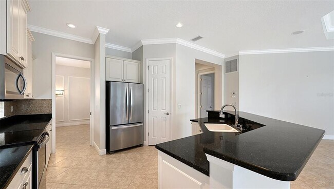 Building Photo - 7244 Orchid Island Pl