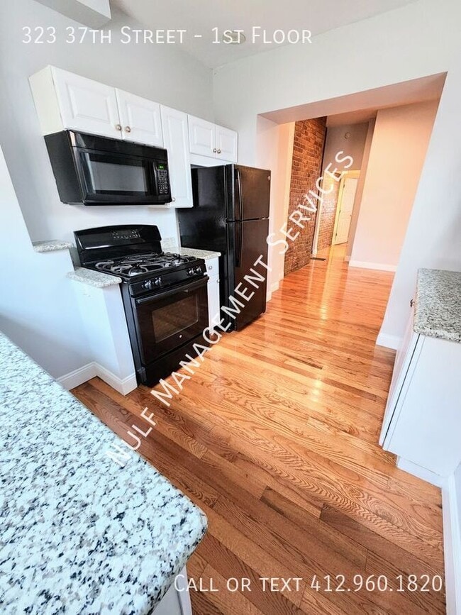 Building Photo - 323 37th St