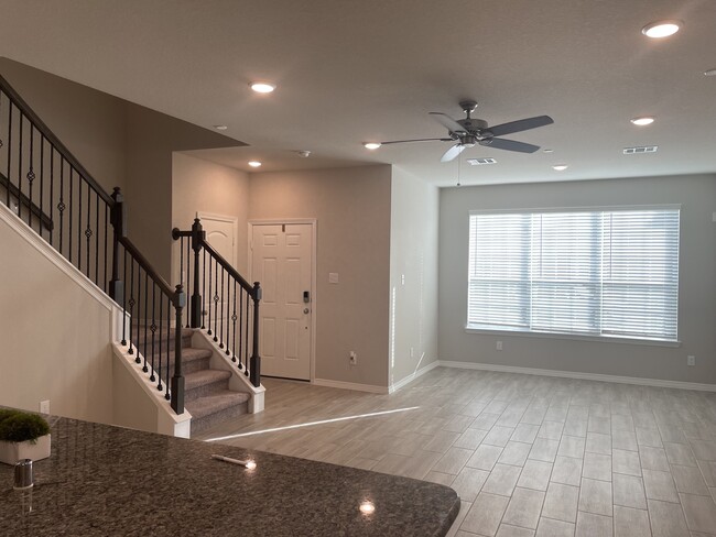 Open concept living room and kitchen - 8036 Scanlan Trl