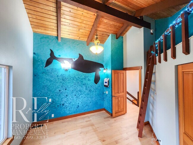 Building Photo - MOVE-IN SPECIAL: 50% OFF FIRST MONTHS RENT - Waterfront Rustic Retreat with Vaulted Ceilings, Pic...