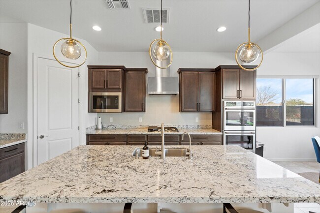 Building Photo - 10812 E Tesla Ave