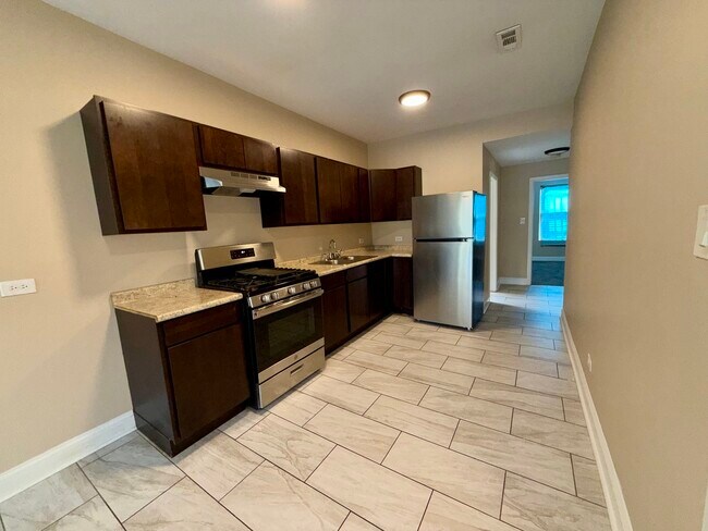 Building Photo - 7208 S Cornell Ave