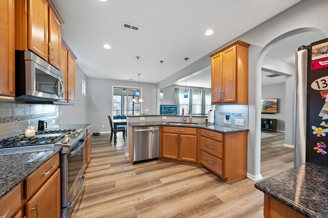 Building Photo - Stunning Apex Home with First-Floor Privat...
