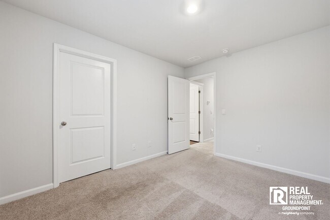 Building Photo - 4 Bedroom Rental in Cane Bay Plantation with Open Layout and Pond View