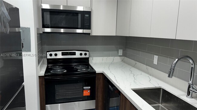 Building Photo - 9107 SW 137th Ter